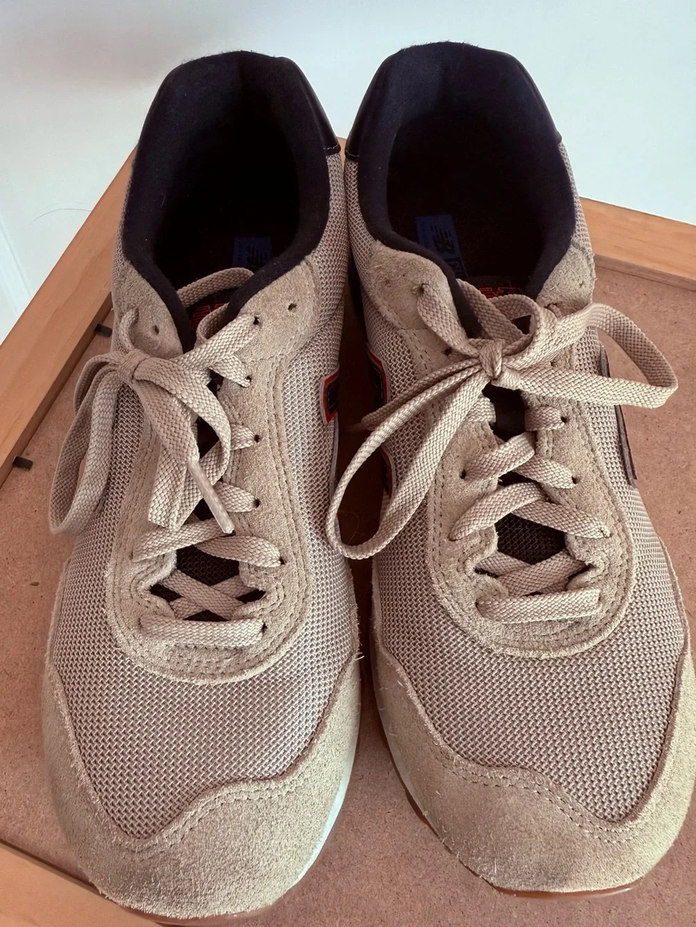 New Balance Men’s Beige and Black Athletic Sneakers with Red Accent